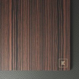 Wood, Output device, Art, Audio equipment, Metal, Rectangle, Fashion accessory, Font, Gadget, Brass